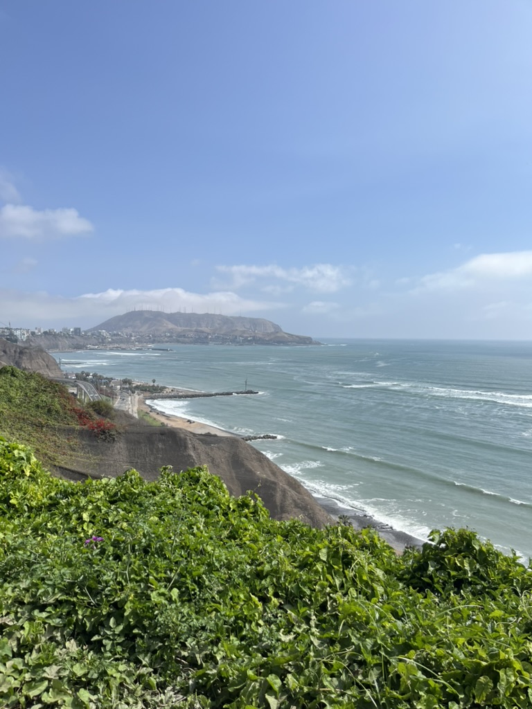 Green cliffs overlooking Lima’s beaches and the Pacific Ocean